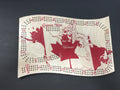 Cribbage board with a map of Canada design on a dark background