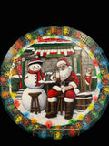 Decorative cribbage board with Santa Claus and snowman design.