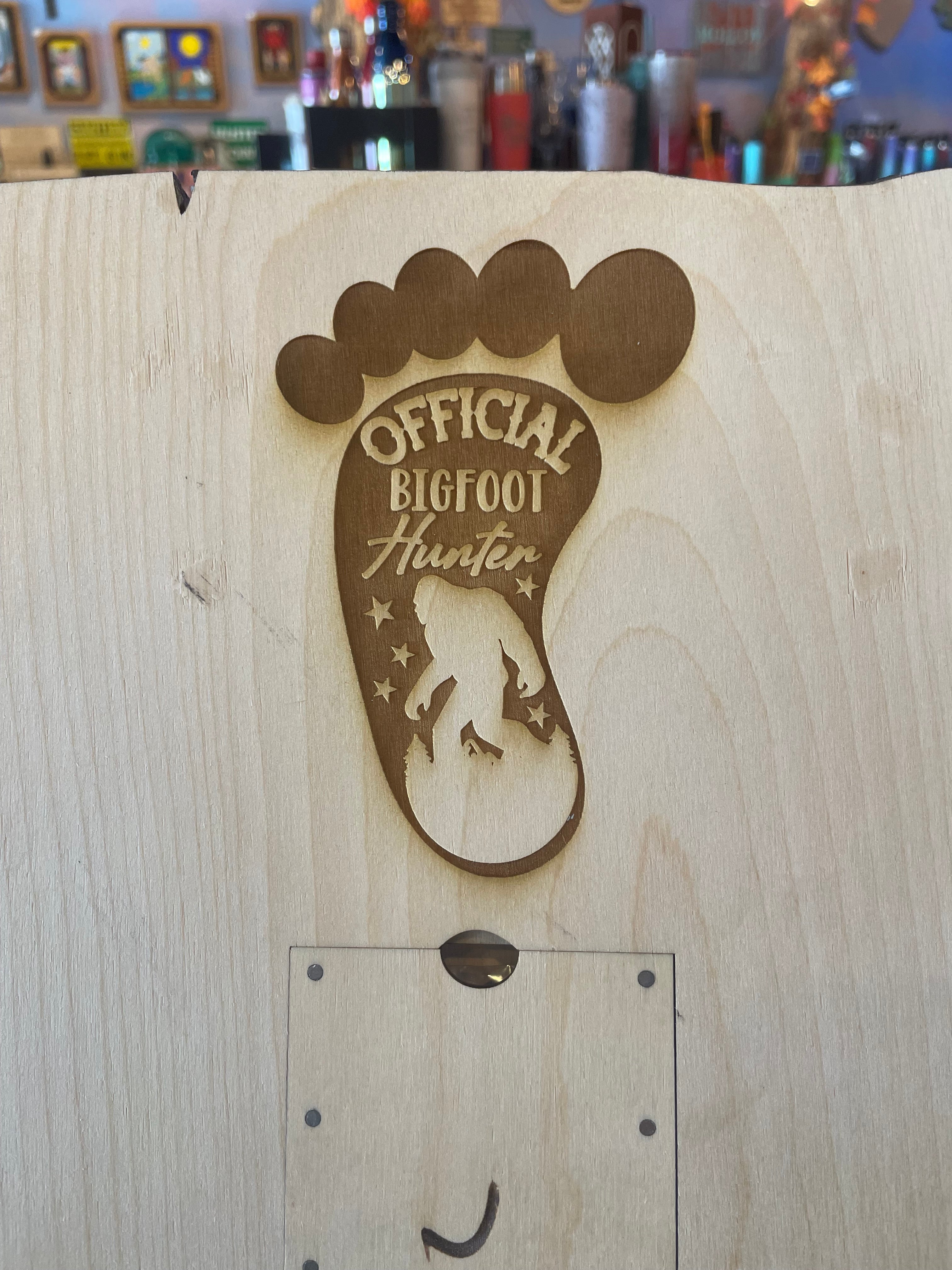 Back of crib board with a Bigfoot design and 'Official Bigfoot Hunter' text.