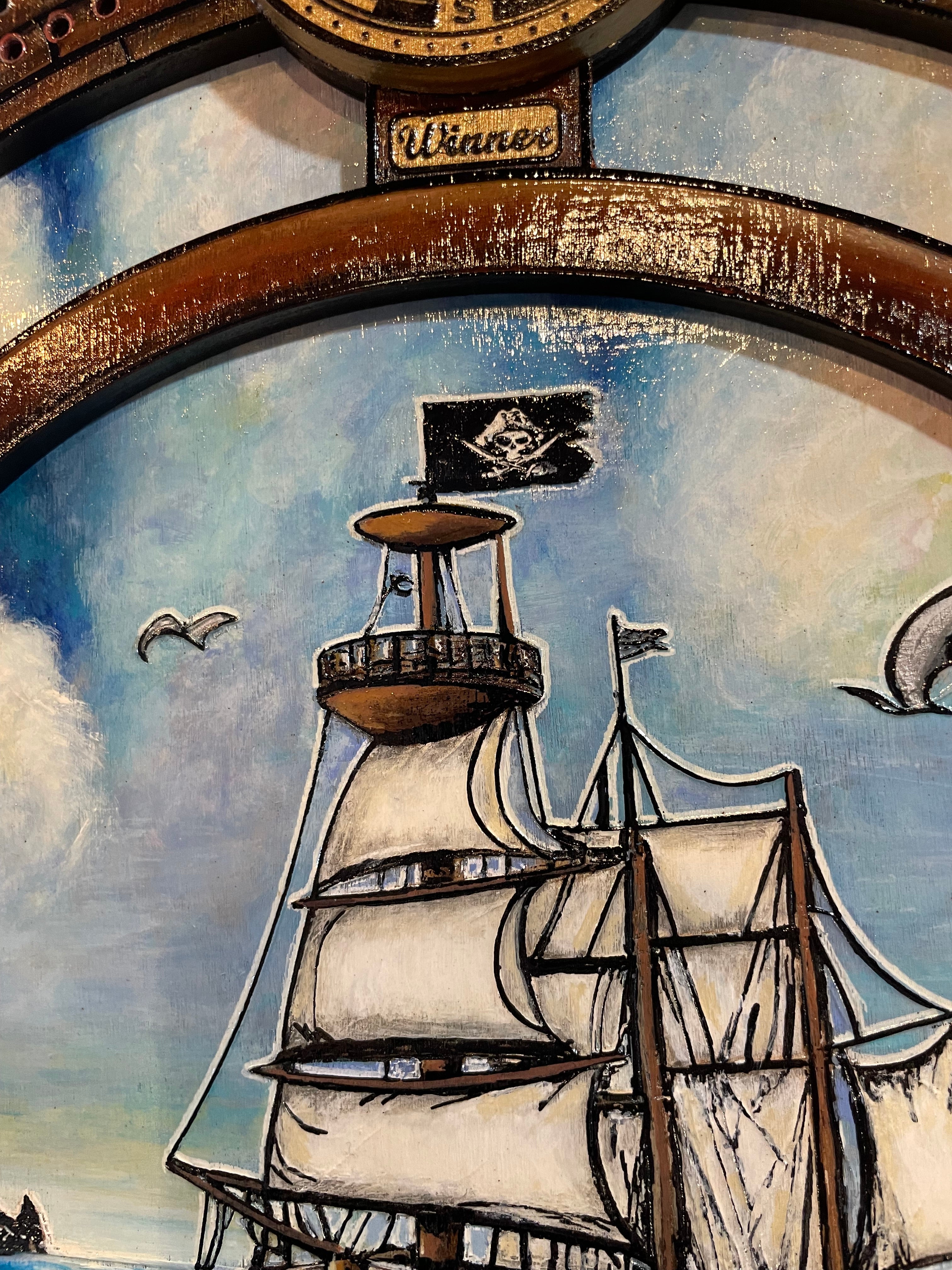 Decorative cribbage board with ship illustration and compass design