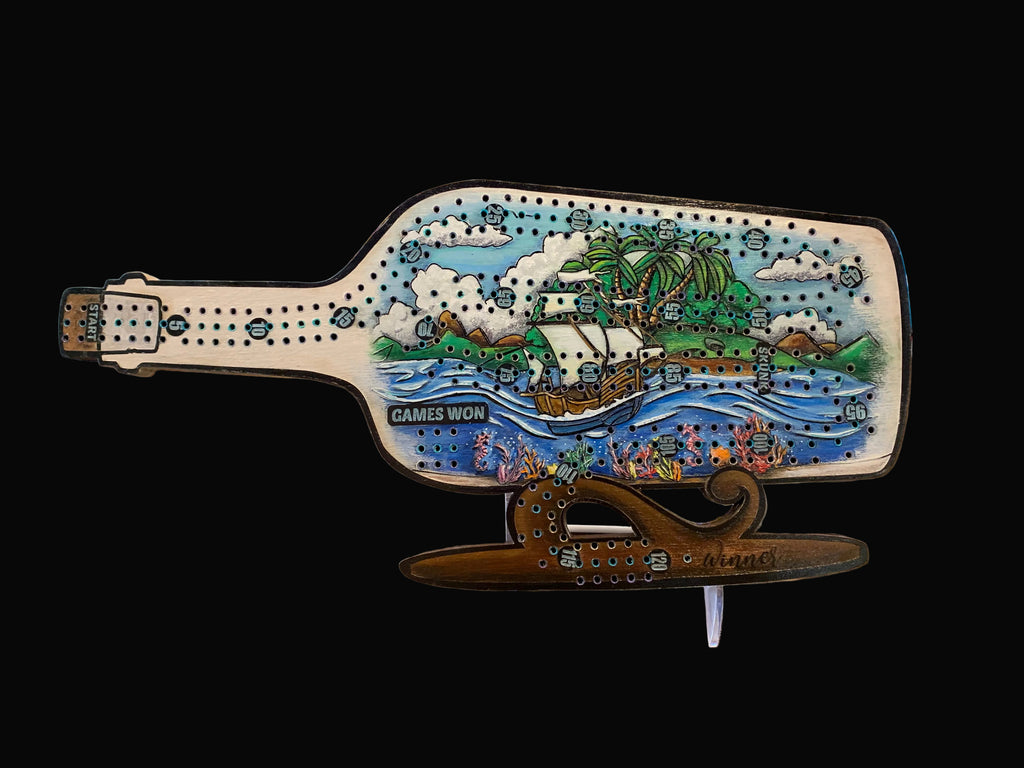 Decorative ship in a bottle cribbage board with a scenic design.
