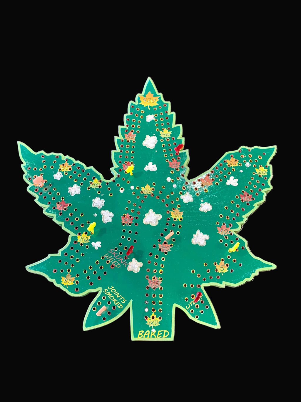 Decorative cannabis leaf cribbage board.